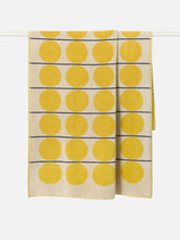 Load image into Gallery viewer, Beach towel with yellow circular patterns on a white background