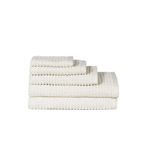 Load image into Gallery viewer, Set of three textured towels in neutral colors on a white background