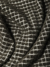 Load image into Gallery viewer, Close-up of textured towel with a grid pattern