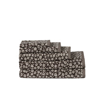 Load image into Gallery viewer, Set of folded towels with a floral pattern on a white background