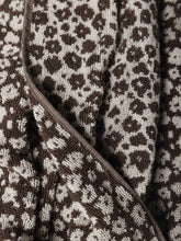 Load image into Gallery viewer, Close-up of a brown and white patterned towel