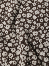 Load image into Gallery viewer, Close-up of brown towel with a subtle white floral pattern